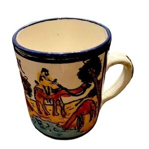 Hand painted ceramic mug, brought home from Jordan.